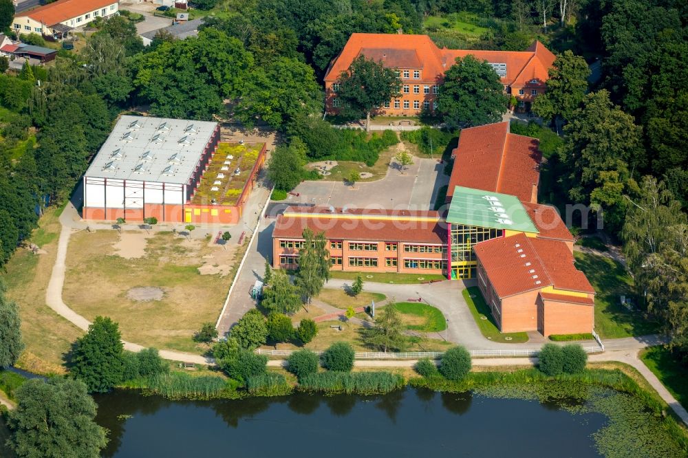 Aerial photograph Burg Stargard - School building of the cooperative school on Muehlenteich pond in Burg Stargard in the state of Mecklenburg - Western Pomerania