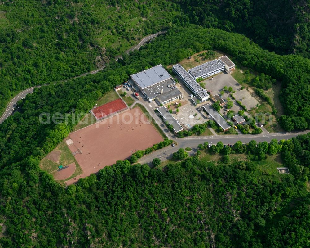 Sankt Goarshausen from above - School building of the Loreley School in Sankt Goarshausen in the state Rhineland-Palatinate. The primary and secondary school is open all day and includes sports facilities and several buildings on a hill in the East of St.Goarshausen