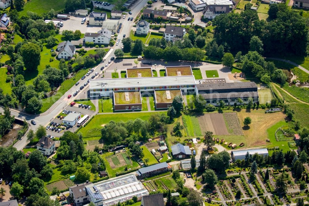 Aerial image Meschede - School building open all-day school Schule unter dem Regenbogen on street Am Rautenschemm in Meschede in North Rhine-Westphalia, Germany