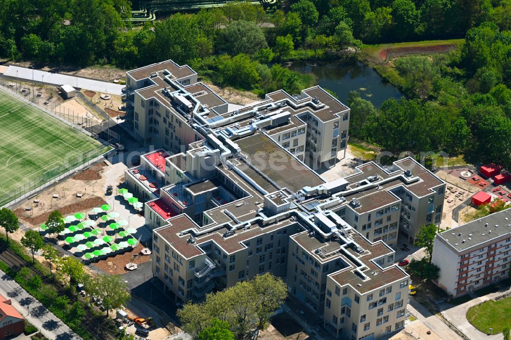 Berlin from above - New school building on Allee der Kosmonauten in the Lichtenberg district of Berlin, Germany