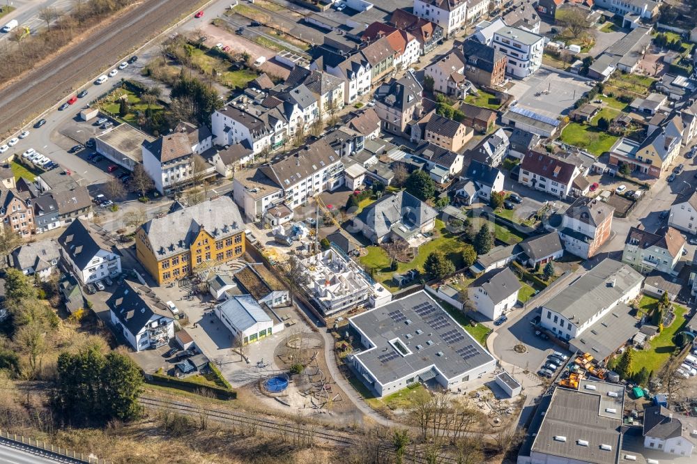 Arnsberg from the bird's eye view: School building of the Roehrschule with a construction site on Marktstrasse in the district Huesten in Arnsberg at Sauerland in the state North Rhine-Westphalia, Germany