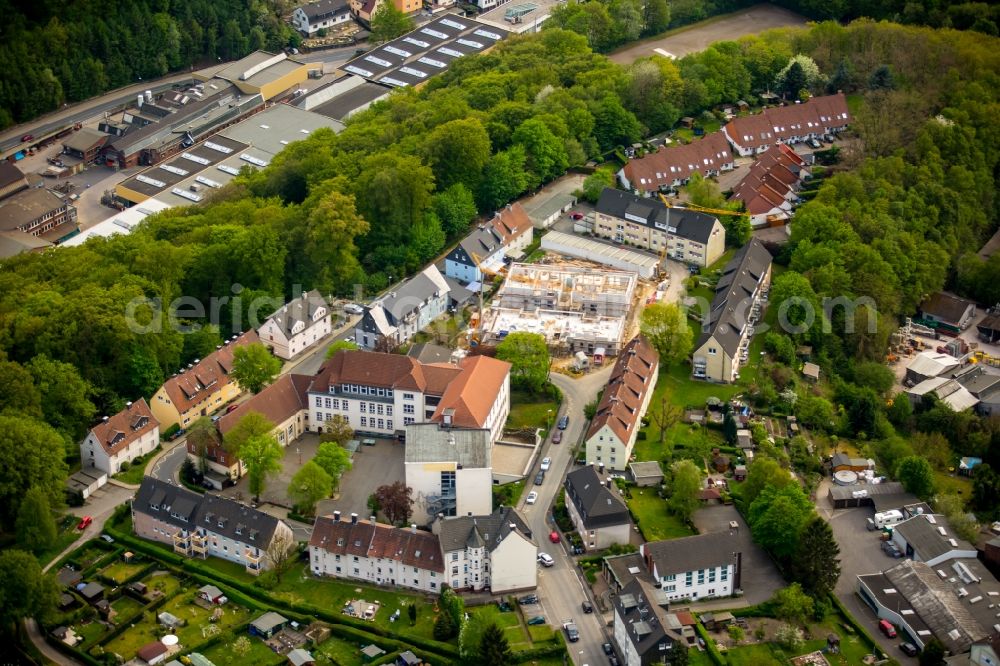 Aerial image Ennepetal - School building of the communal secondary school and construction site of two residential buildings in Ennepetal in the state of North Rhine-Westphalia