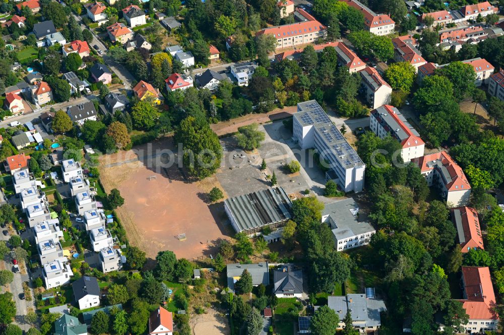 Berlin from above - School building and sports field Merian-Oberschule on street Mittelheide in the district Koepenick in Berlin, Germany