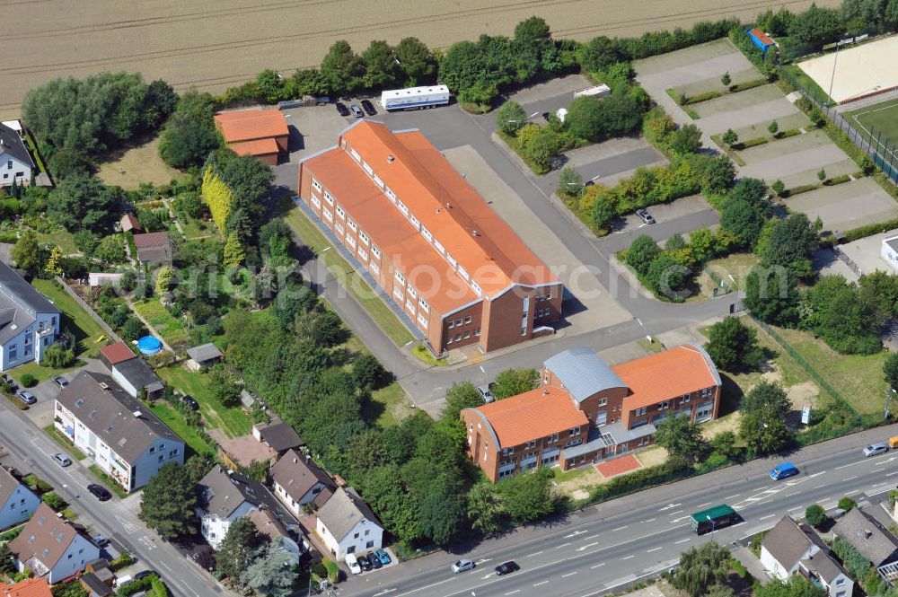 Unna from the bird's eye view: Schulungszentrum mit Lagerhalle an der Kamener Straße in Unna in Nordrhein-Westfalen / North Rhine-Westphalia. Ein Projekt der Unternehmensgruppe Markus Gerold.