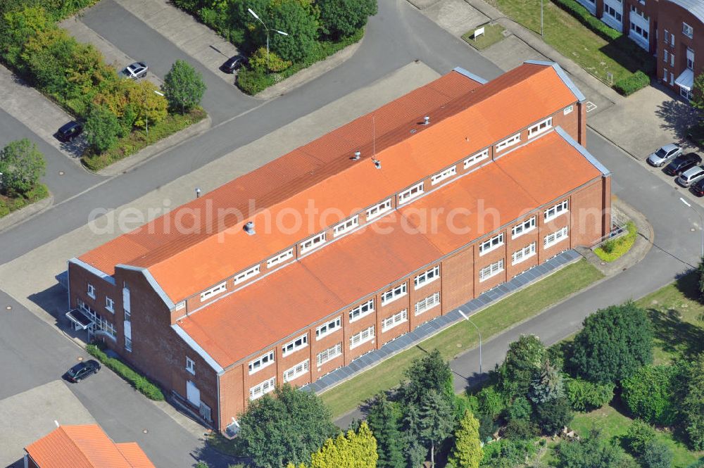 Unna from the bird's eye view: Schulungszentrum mit Lagerhalle an der Kamener Straße in Unna in Nordrhein-Westfalen / North Rhine-Westphalia. Ein Projekt der Unternehmensgruppe Markus Gerold.