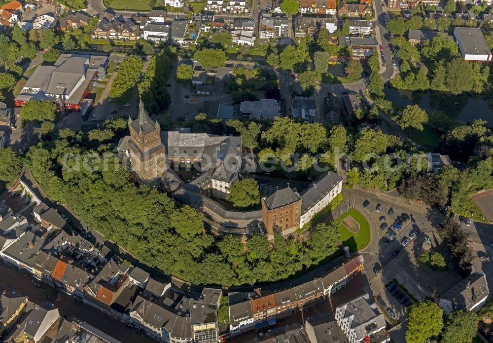 Kleve from above - View of the Schwanenburg in Cleves in the state North Rhine-Westphalia. The Schwanenburg is the landmark of Cleves and was constructed by the Dukes of Cleves. Today are the district court and the regional court of Cleves located in the castle