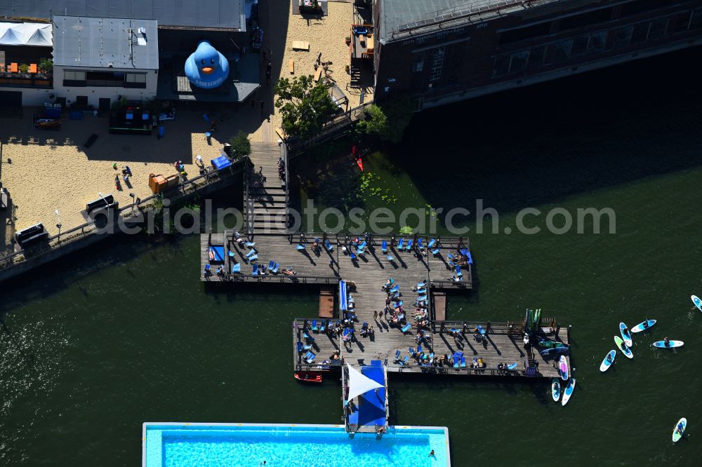 Aerial image Berlin - Swimming pool of the Badeschiff on river Spree on Eichenstrasse in the district Treptow in Berlin, Germany