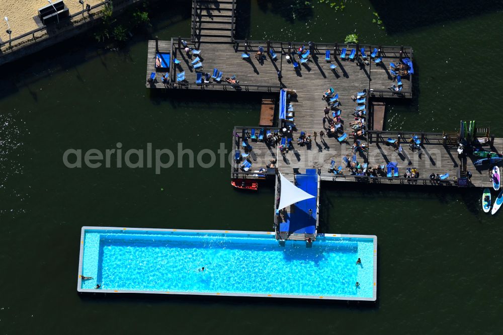 Berlin from above - Swimming pool of the Badeschiff on river Spree on Eichenstrasse in the district Treptow in Berlin, Germany