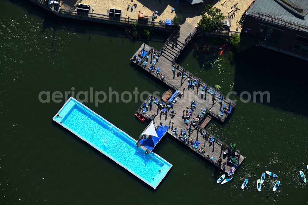 Aerial image Berlin - Swimming pool of the Badeschiff on river Spree on Eichenstrasse in the district Treptow in Berlin, Germany