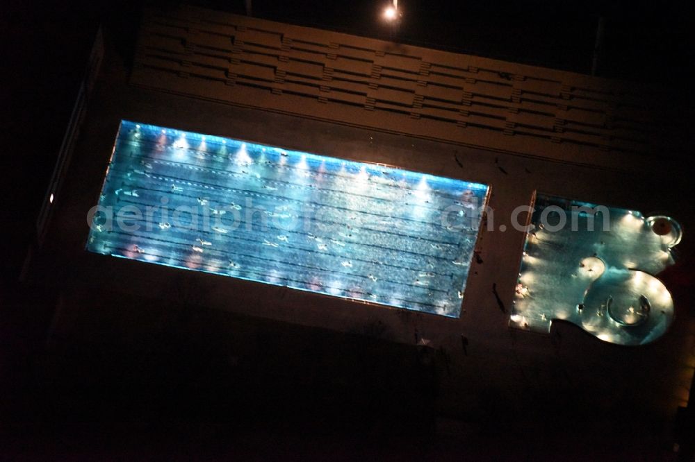 Aerial image München - Night view Swimming pool of the Dante-Winter-Warmfreibad an der Postillonstrasse in Munich in the state Bavaria