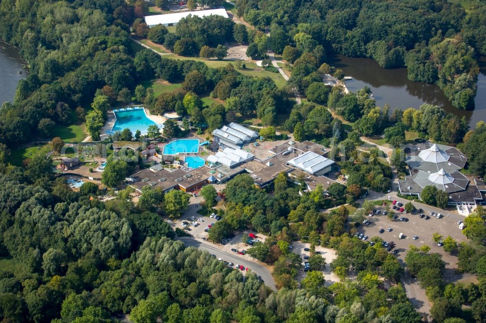 Dortmund from above - Swimming pools of an outdoor swimming pool in the Revierpark Wischlingen in Dortmund in the federal state North Rhine-Westphalia. The park is a green arrangement and recreational arrangement in the Dortmund town district of Huckarde. He lies immediately beside the nature reserve Hallerey