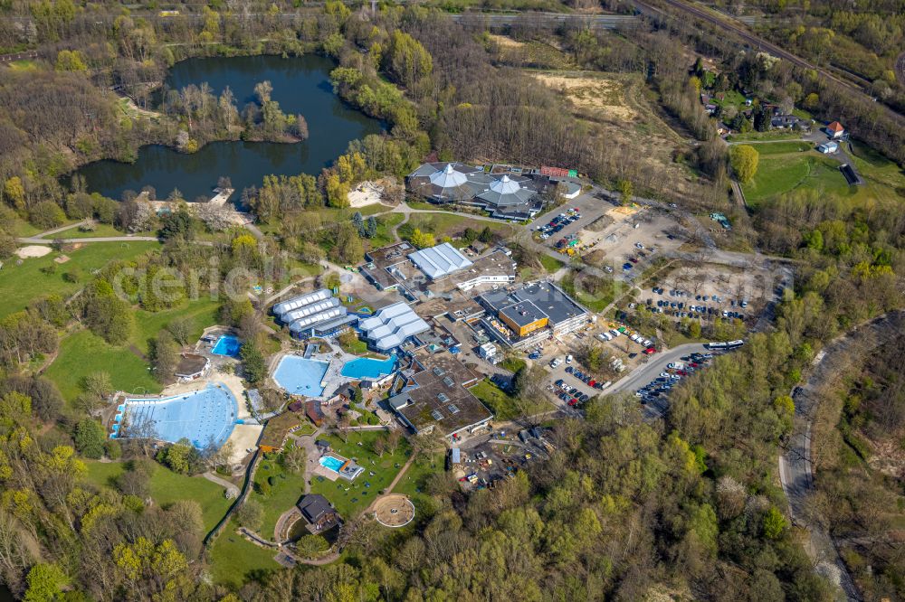 Aerial photograph Dortmund - Swimming pools of an outdoor swimming pool in the Revierpark Wischlingen in Dortmund in the federal state North Rhine-Westphalia. The park is a green arrangement and recreational arrangement in the Dortmund town district of Huckarde. He lies immediately beside the nature reserve Hallerey