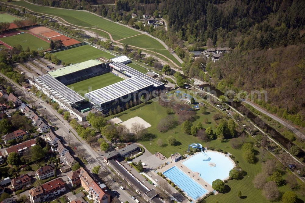 Freiburg im Breisgau from above - Swimming pool of the Strandbad in Freiburg im Breisgau in the state Baden-Wuerttemberg. Behind this the Schwarzwald Stadium of the soccer club SC Freiburg