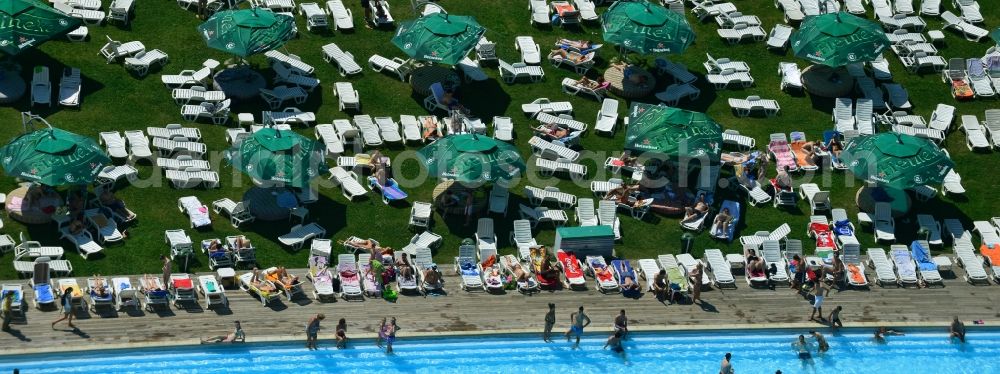 Bukarest from the bird's eye view: Swimming pool and sunbathing at the pool - swimming pool Strandul Tineretului in Bucharest, Romania