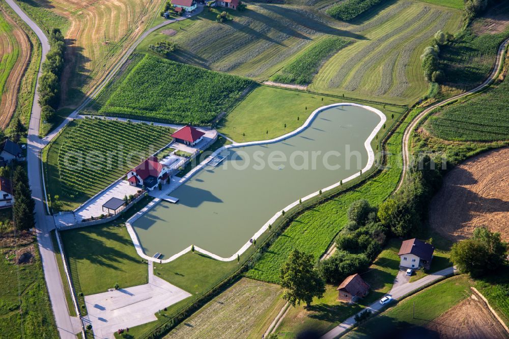 Aerial image Bresnica - Swimming pool at a winery in Bresnica in Ormoz, Slovenia