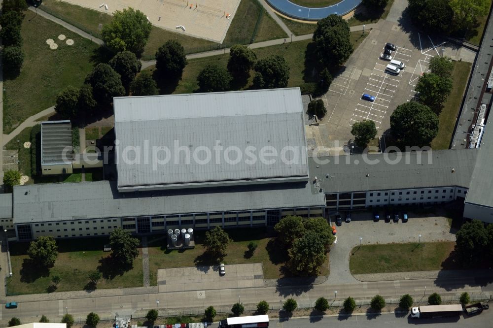 Berlin from above - Swimming hall and indoor pool of the Sportforum Hohenschoenhausen in the Alt-Hohenschoenhausen part of the district of Lichtenberg in Berlin in Germany. The second largest sports and training facilities of Berlin include a complex of sports halls which are listed as protected buildings