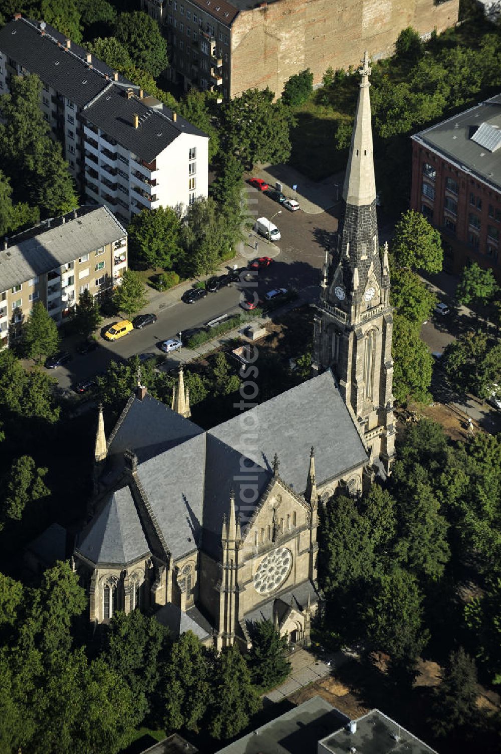 Aerial image Berlin - Blick auf die katholische Kirche St. Sebastian in Berlin- Prenzlauer Berg, Gesundbrunnen. Die zwischen 1890 und 1893 erbaute Kirche, ist im neugotischen Stil gehalten. Die Kirchengemeinde St. Sebastian ist die zweitälteste katholische Kirchengemeinde in Berlin, seit der Reformation. View of the Catholic Church of St. Sebastian in Berlin's Prenzlauer Berg, Gesundbrunnen. The church, built 1890-1893, is held in the neo-Gothic style. The Church of St. Sebastian is the second oldest Catholic church in Berlin, since the Reformation.