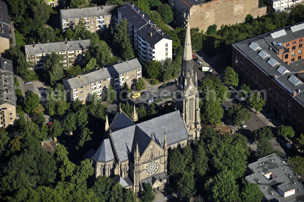 Aerial photograph Berlin - Blick auf die katholische Kirche St. Sebastian in Berlin- Prenzlauer Berg, Gesundbrunnen. Die zwischen 1890 und 1893 erbaute Kirche, ist im neugotischen Stil gehalten. Die Kirchengemeinde St. Sebastian ist die zweitälteste katholische Kirchengemeinde in Berlin, seit der Reformation. View of the Catholic Church of St. Sebastian in Berlin's Prenzlauer Berg, Gesundbrunnen. The church, built 1890-1893, is held in the neo-Gothic style. The Church of St. Sebastian is the second oldest Catholic church in Berlin, since the Reformation.