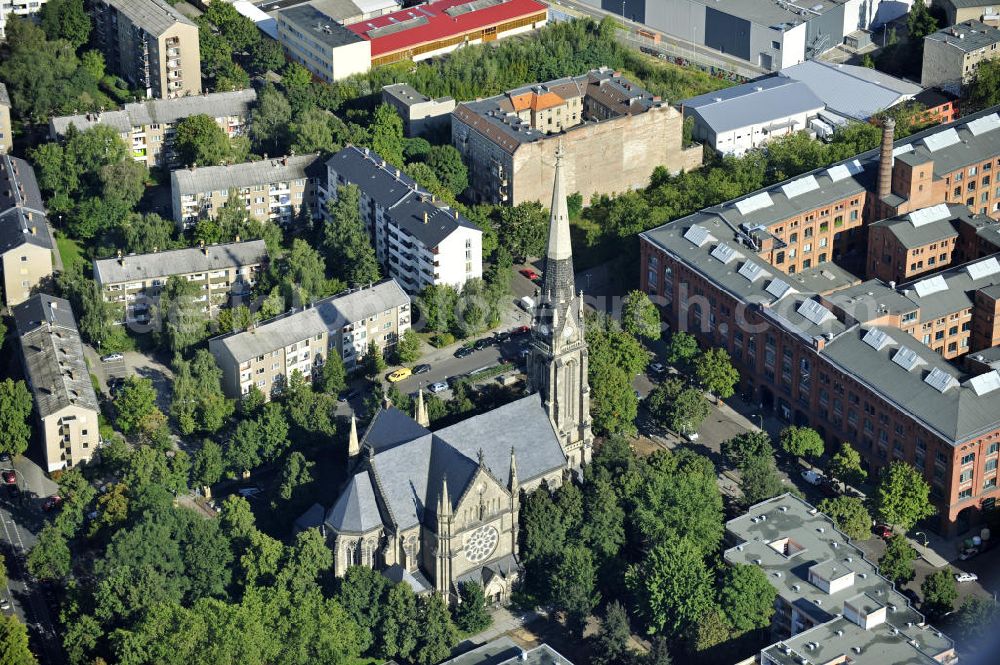 Aerial image Berlin - Blick auf die katholische Kirche St. Sebastian in Berlin- Gesundbrunnen (zu Mitte). Die zwischen 1890 und 1893 erbaute Kirche, ist im neugotischen Stil gehalten. Die Kirchengemeinde St. Sebastian ist die zweitälteste katholische Kirchengemeinde in Berlin, seit der Reformation. View of the Catholic Church of St. Sebastian in Berlin's , Gesundbrunnen. The church, built 1890-1893, is held in the neo-Gothic style. The Church of St. Sebastian is the second oldest Catholic church in Berlin, since the Reformation.