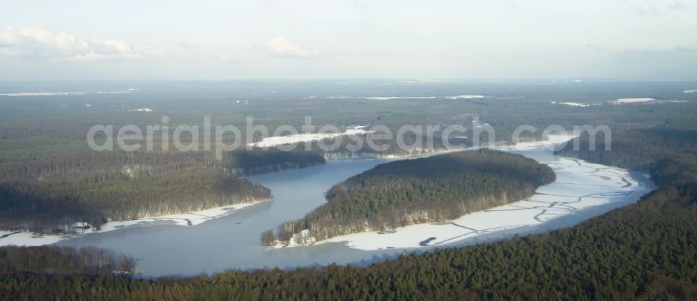 Lanke from the bird's eye view: Lake Island on the wintry snowy Liepnitzsee in Lanke in the state Brandenburg