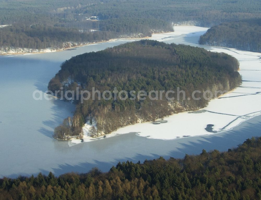 Aerial image Lanke - Lake Island on the wintry snowy Liepnitzsee in Lanke in the state Brandenburg