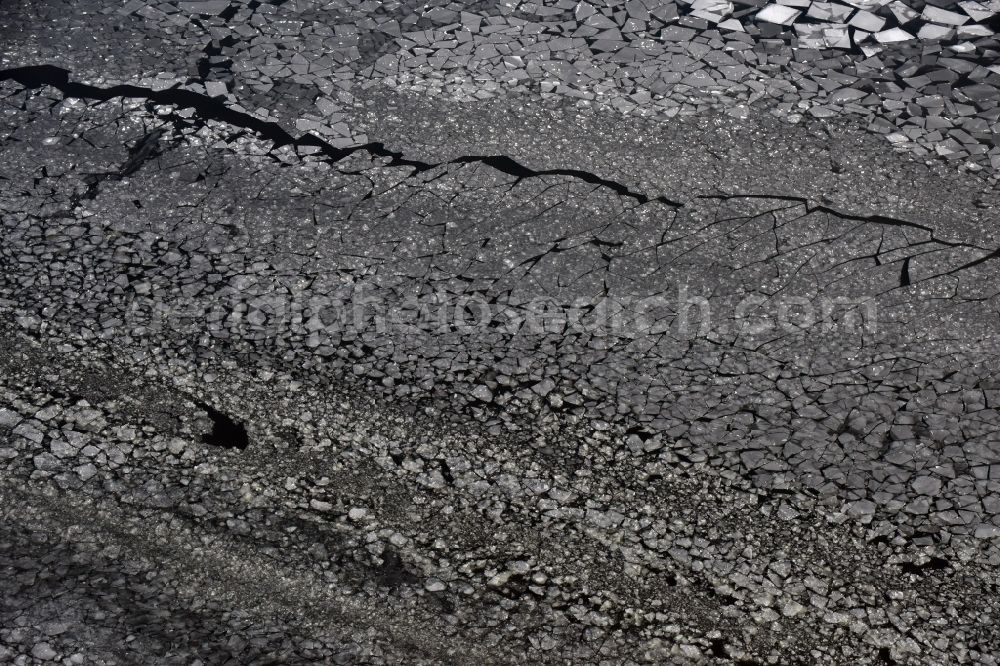 Wusterwitz from above - Overseas territory of Wendsee with wintry snowy drift ice on the frozen water surface at Kirchmoeser in Brandenburg