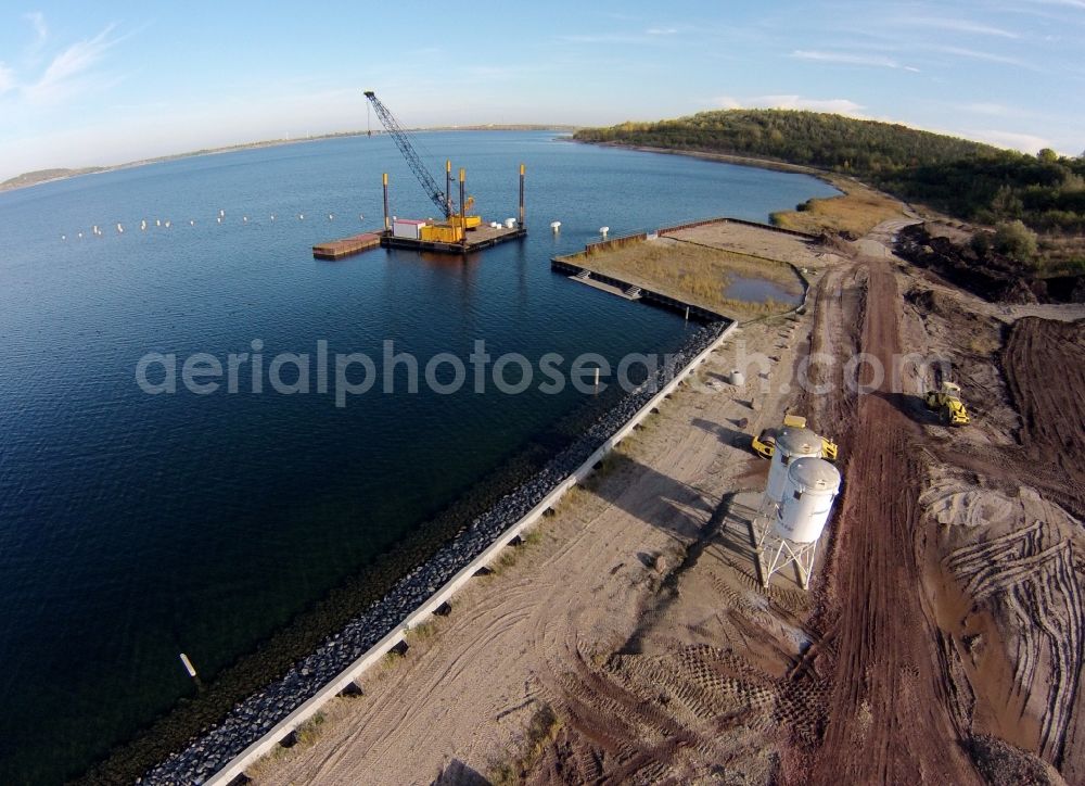 Aerial image Mücheln - Piers construction site - construction on the banks of reclamation by a brown coal - resulting pit lake in the mining landscape at Geisel Muecheln in Saxony-Anhalt