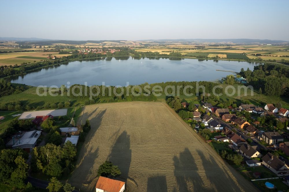 Aerial photograph Seeburg - View of the Seeburger lake with landscape at dusk in Seeburg in the state of Lower Saxony