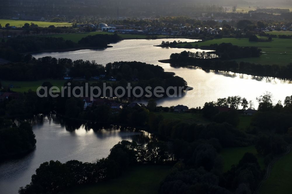 Groß Schönebeck from above - Waterfront landscape on the lake Kuhpanzsee - Weisser See in Gross Schoenebeck in the state Brandenburg, Germany