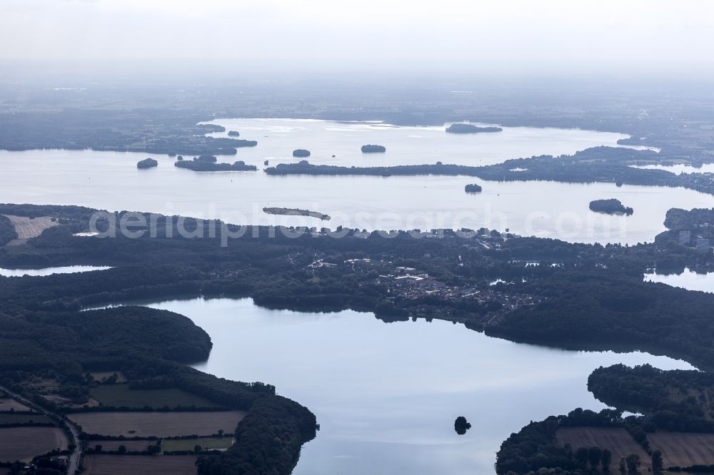 Plön from the bird's eye view: Lakes chain and bank areas of the Suhrer lake and the big Ploener lake in the district town moor in Ploen in the federal state Schleswig-Holstein