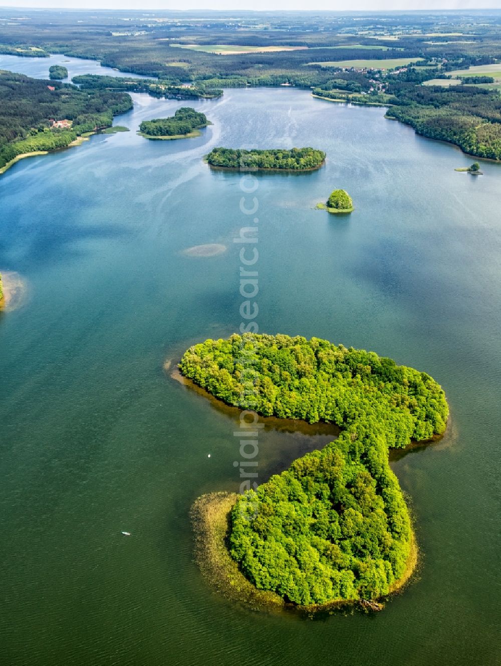 Zakowo from above - Waterfront landscape on the lake in Zakowo in pomorskie, Poland