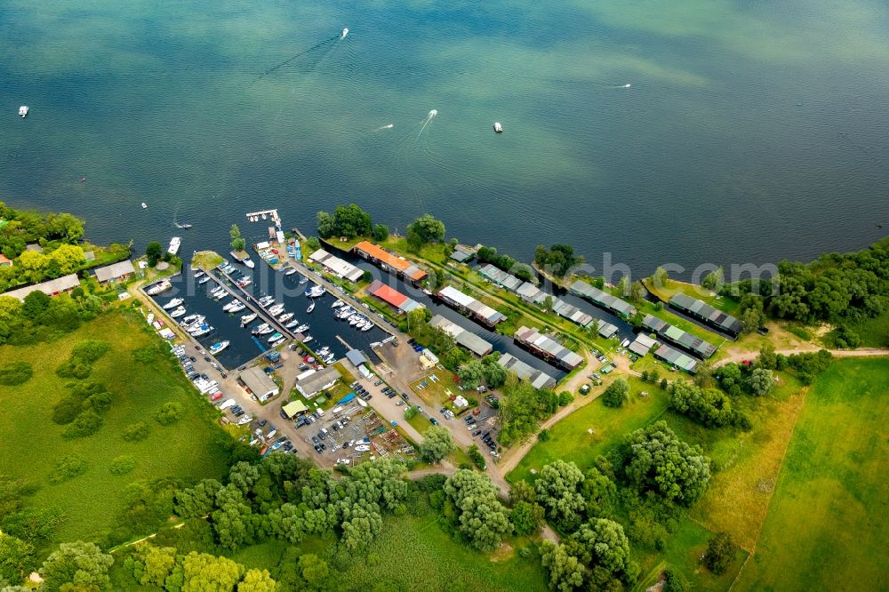 Plau am See from above - Sailing boat marina with docks and moorings of Yachtcharter Schroeder Charterbasis Segelschule Plau and Marina und Segelschule Plau am See on the shore area in Plau am See in the state Mecklenburg - Western Pomerania