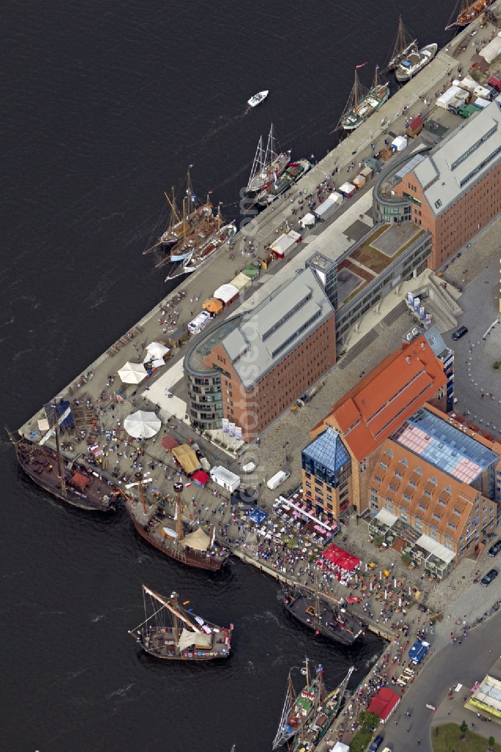 Aerial image Rostock Warnemünde - Sailing boats and historic ships in the museum on the occasion of the Hanse Sail Rostock on the Baltic Sea - coast in Mecklenburg-Western Pomerania