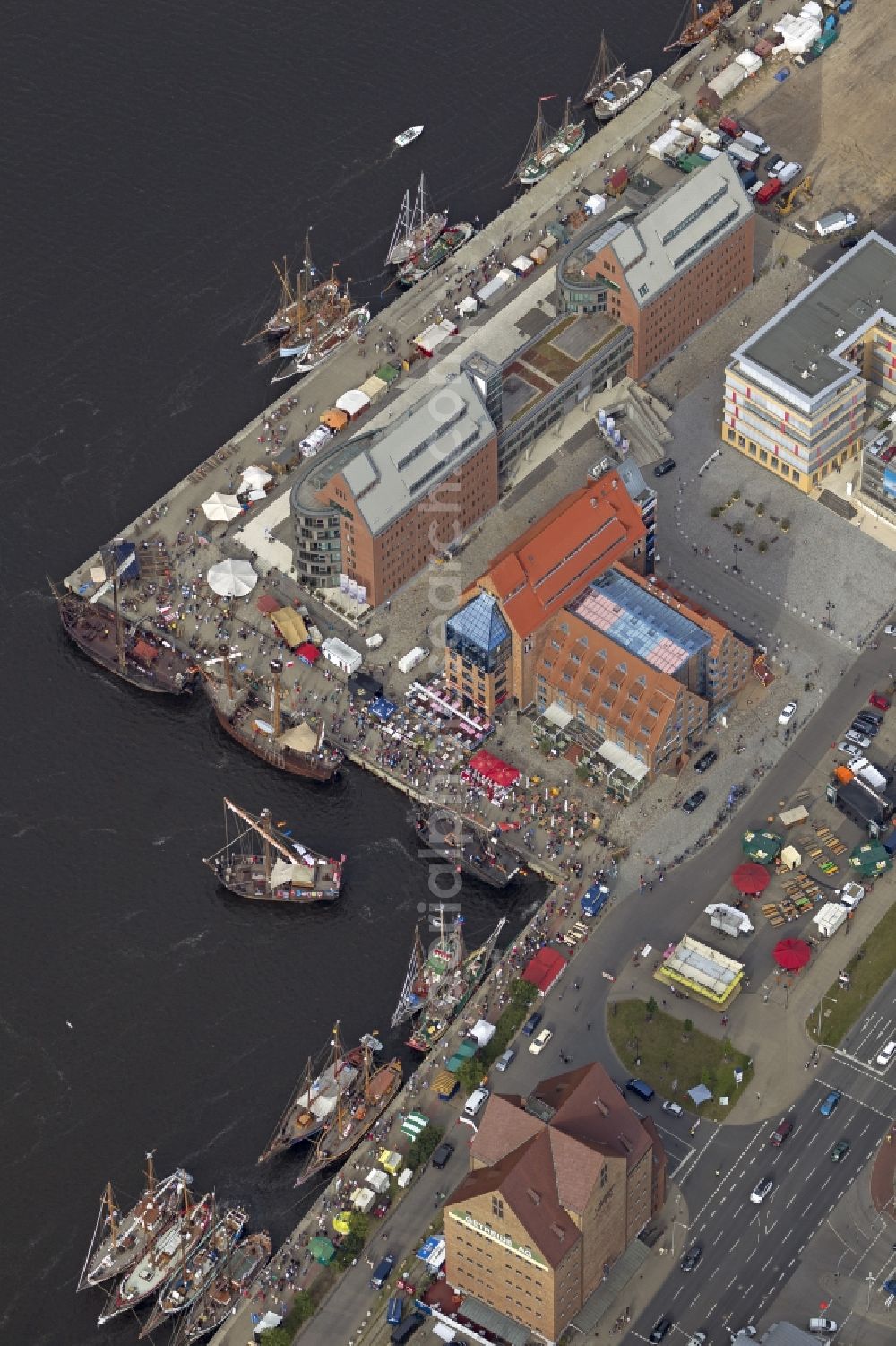 Aerial photograph Rostock Warnemünde - Sailing boats and historic ships in the museum on the occasion of the Hanse Sail Rostock on the Baltic Sea - coast in Mecklenburg-Western Pomerania