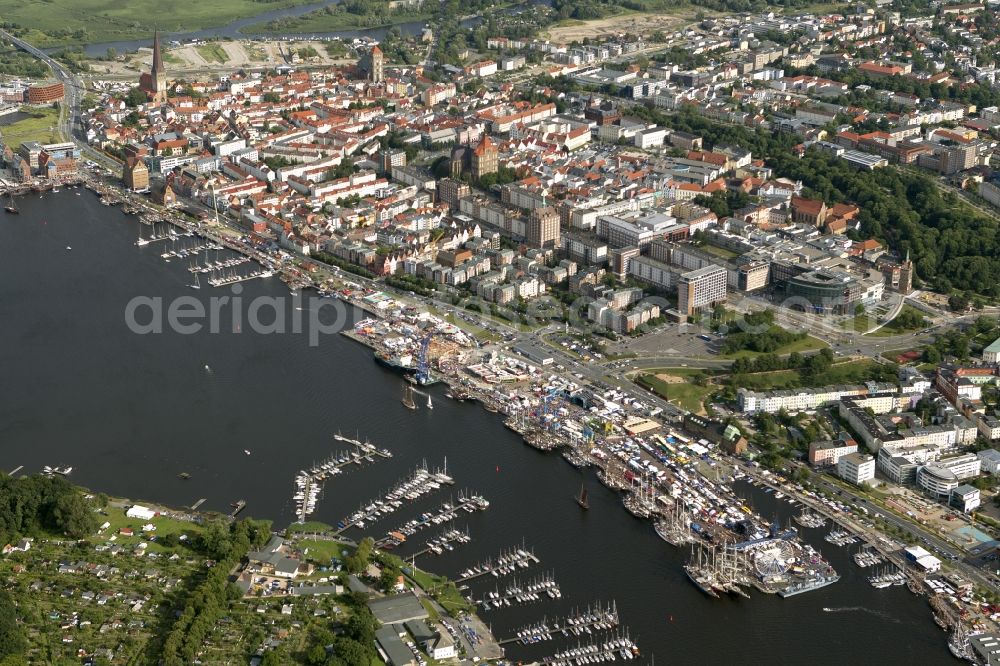 Aerial photograph Rostock Warnemünde - Sailing boats and historic ships in the museum on the occasion of the Hanse Sail Rostock on the Baltic Sea - coast in Mecklenburg-Western Pomerania