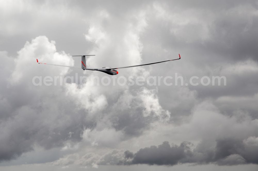 Vars from the bird's eye view: Glider and sport aircraft ASH26 D-KRLH flying above the pass Col de vars in Vars in Provence-Alpes-Cote d'Azur, France