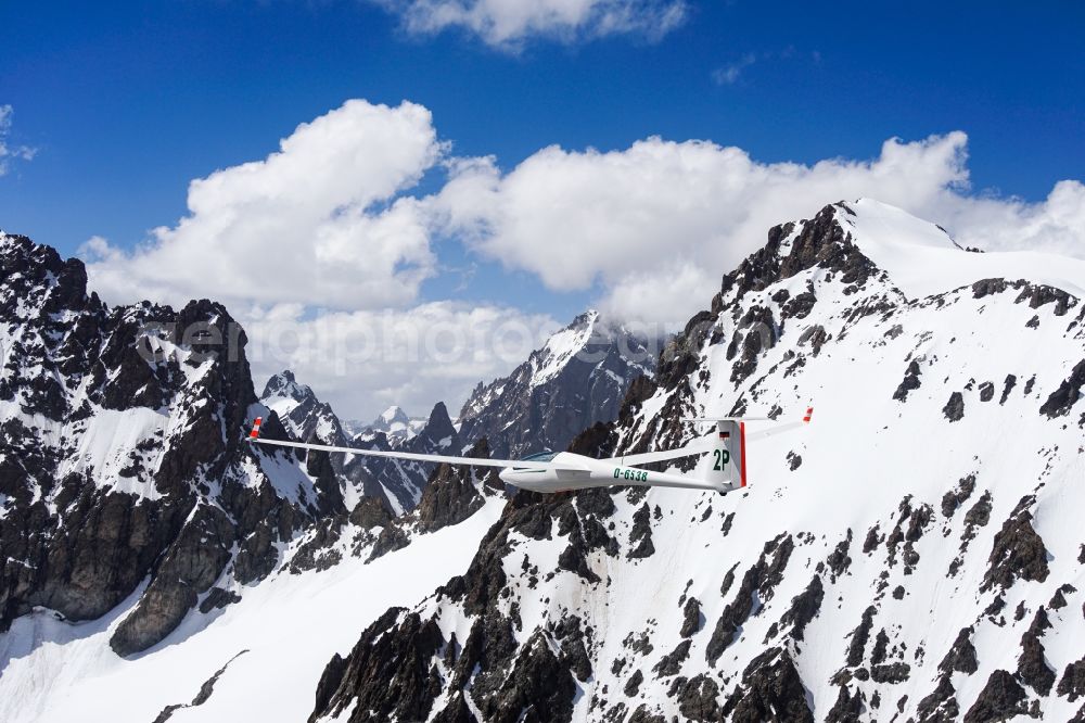 Aerial photograph Vallouise - Glider and sport aircraft ASW 20 D-6538 flying over the airspace of the La Blanche mountain in Provence-Alpes-Cote d'Azur, France