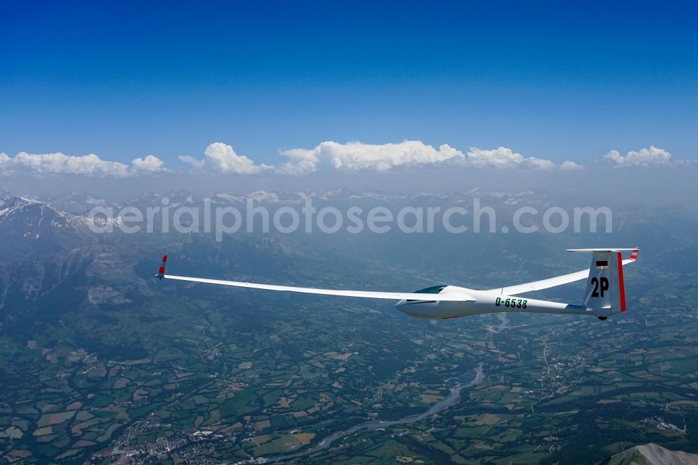 Gap from the bird's eye view: Glider ASW 20 D-6538 in flight above the Pic de Bure in the Provence-Alpes-Cote d'Azur, France