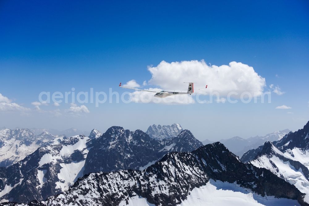 La Chapelle-en-Valgaudémar from the bird's eye view: Glider and sport aircraft ASW 20 D-6538 flying over the mountains of the Ecrins national park in Provence-Alpes-Cote d'Azur, France
