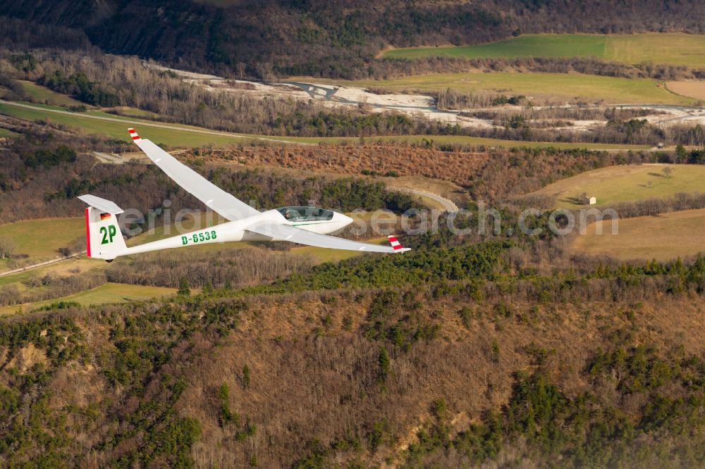 Aerial image Aspremont - Glider and sport airplane ASW 20 D-6538 in flight over autumn forest at Aspremont in Provence-Alpes-Cote d'Azur, France