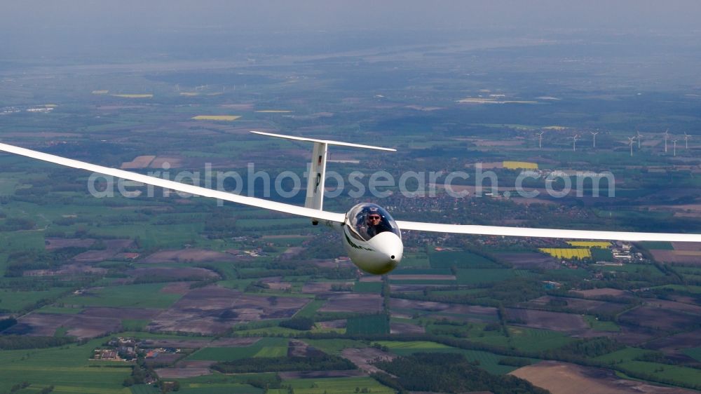 Aerial photograph Bremervörde - High performance glider Alexander Schleicher ASW-27 flying over the airspace in Bremervoerde in the state Lower Saxony, Germany