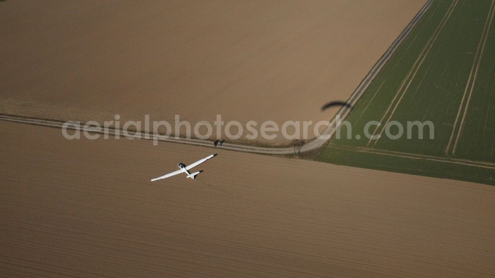 Aerial image Holtorf - Glider and sport airplane TWIN ASTIR II D-3078 (B3) a??Twinberta?? after an outlanding in a field in Holtorf in the state North Rhine-Westphalia, Germany