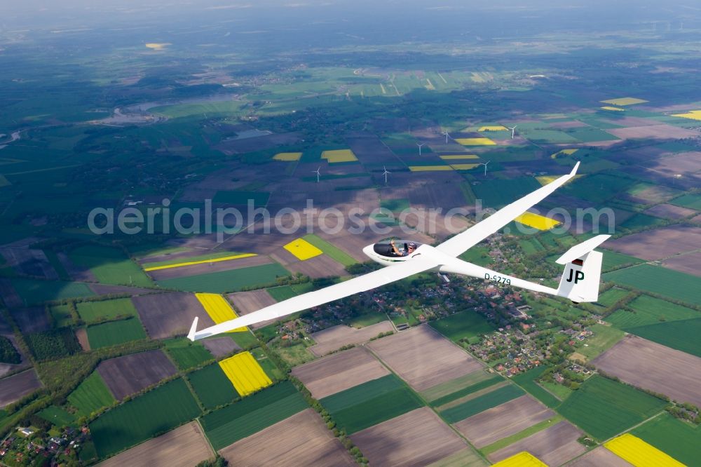 Estorf from above - High performamce sailplane ASW-27 with callsign D-9279 JP over Estorf in the state of Lower Saxony, Germany