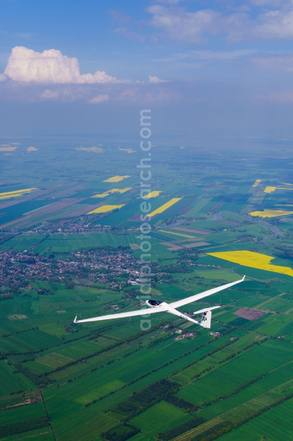 Aerial image Hemmoor - Glider of type ASW 27 D-9279 JP flies over Hemmoor in Lower Saxony, Germany