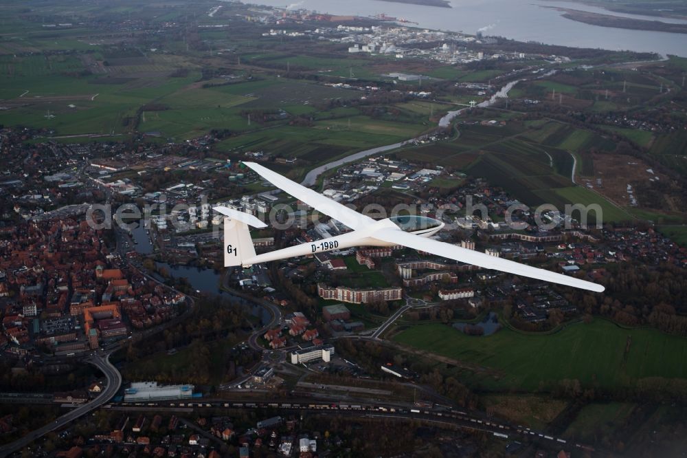 Stade from the bird's eye view: Glider while dusk above the city center of the Hanseatic city of Stade in the state of Lower Saxony, Germany