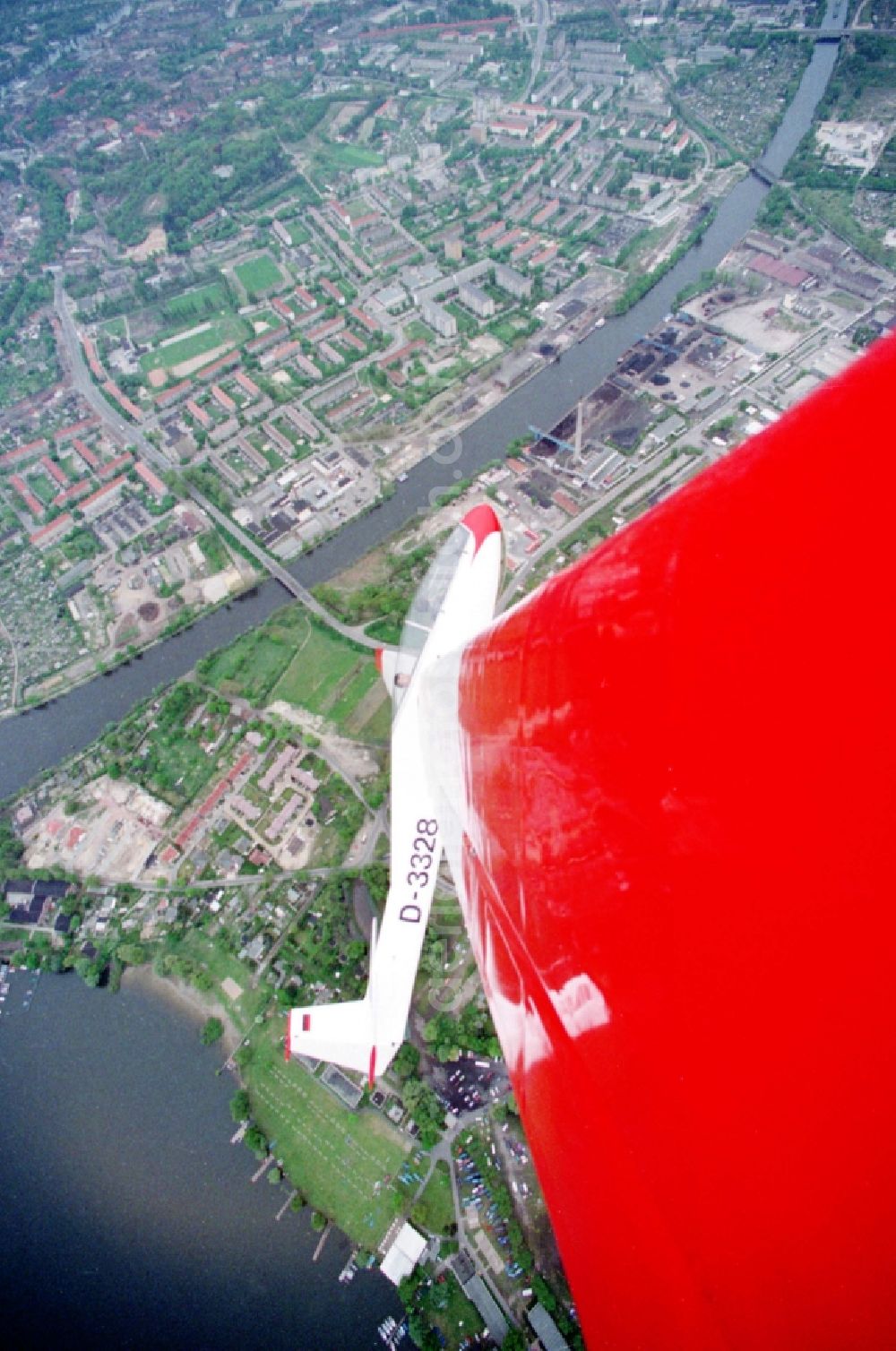 Aerial photograph Brandenburg an der Havel - Glider and sport aircraft Bocian with of call sign D-3328 flying over the airspace in Brandenburg an der Havel in the state Brandenburg, Germany