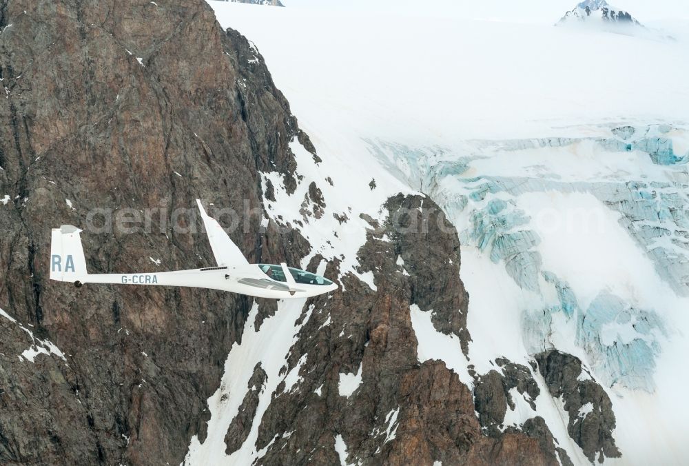 Aerial photograph La Chapelle-en-Valgaudémar - Glider DG-800 G-CCRA flying over the ice- and snow-capped rock of the Ecrins National Park near La Chapelle-en-Valgaudemar in Provence-Alpes-Cote d'Azur, France