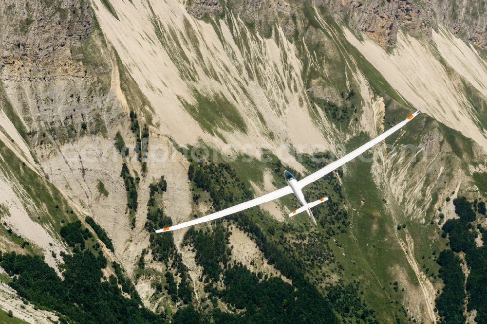 Aerial image Montmaur - Glider in flight above the rocks of pic de bure at Montmaur in Provence-Alpes-Cote d'Azur, France