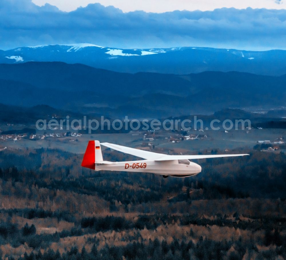 Ettenheim from the bird's eye view: Glider and sport aircraft Ka 8 in Hangflug flying over the airspace in Ettenheim in the state Baden-Wurttemberg, Germany