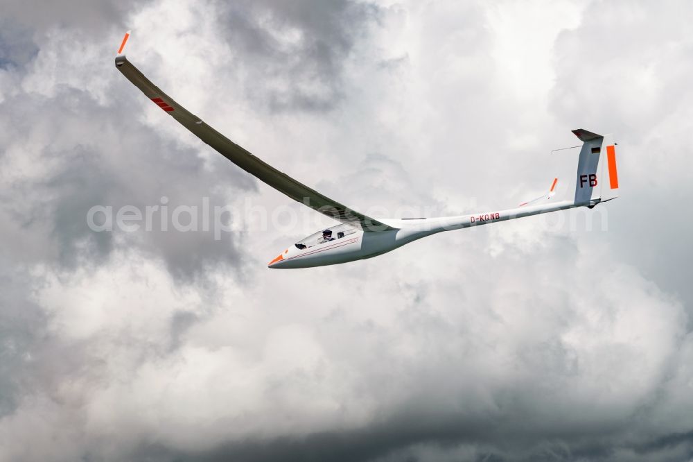 Montmaur from the bird's eye view: Glider EB28 D-KQWB in flight over the mountain Pic de Bure at Montmaur in Provence-Alpes-Cote d'Azur, France. The EB 28 is a double-seated glider of the open class